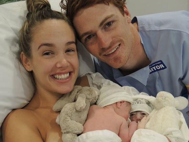 Sydney Swans player Gary Rohan, with wife Amie and newborn twins Willow and Bella.