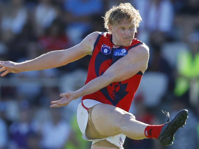 PERTH, AUSTRALIA - MARCH 02: Clayton Oliver of the Demons kicks the ball into the forward 50 during the 2025 AAMI AFL Community Series match between Fremantle Dockers and Melbourne Demons at Rushton Park on March 02, 2025 in Mandurah, Australia. (Photo by James Worsfold/AFL Photos/via Getty Images)