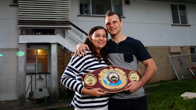 World champion Jeff Horn and wife Jo at their Acacia Ridge home yesterday. Picture: Adam Head