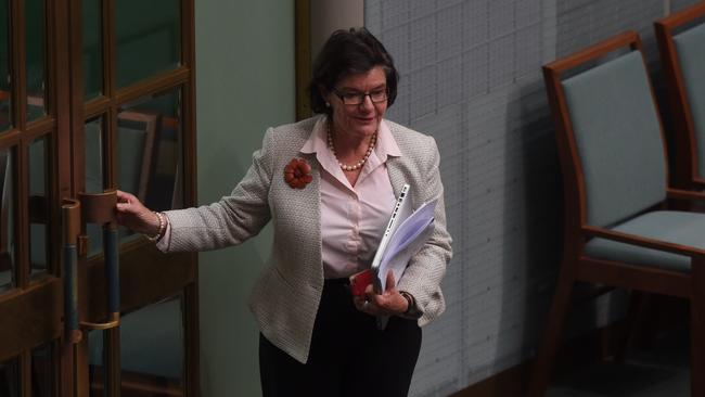 Independent MP Cathy McGowan leaves during question time yesterday.