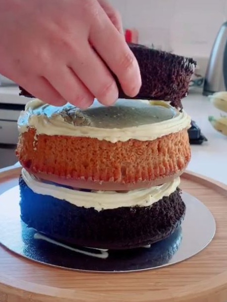 Then add the others with icing between the layers. Picture: TikTok