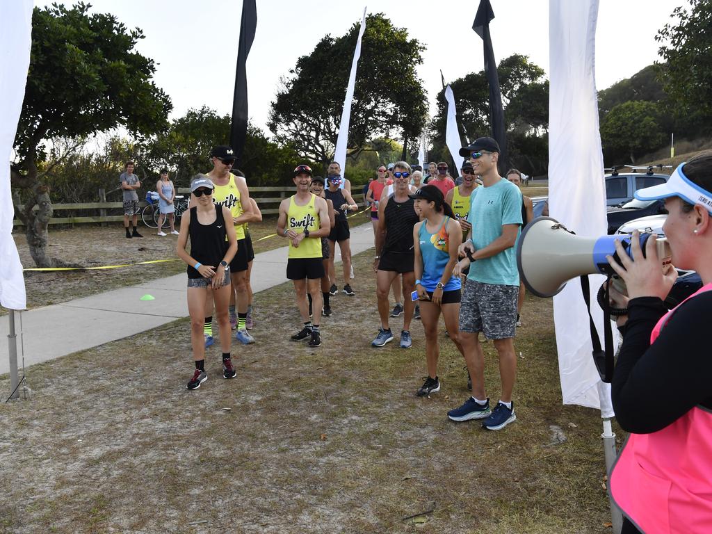 Competitors take off from the Whiting Beach start of the Yamba Triathlon Fun Run on Saturday morning.