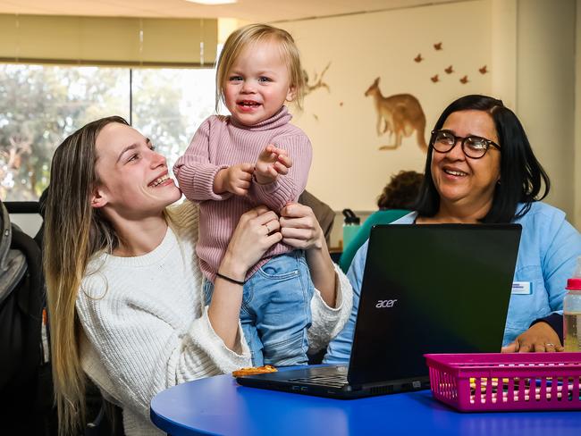 Chrisites Beach High School student Yasmin with , Isla, 2, and teacher Del Brownridge, on July 5th, 2022, at Christie Downs.Picture: Tom Huntley