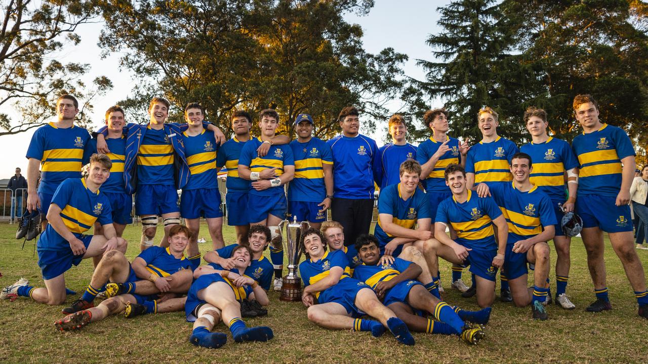 Members of TGS rugby celebrate the First XV defeating Downlands to claim the O'Callaghan Cup on Grammar Downlands Day at Downlands College, Saturday, August 6, 2022. Picture: Kevin Farmer