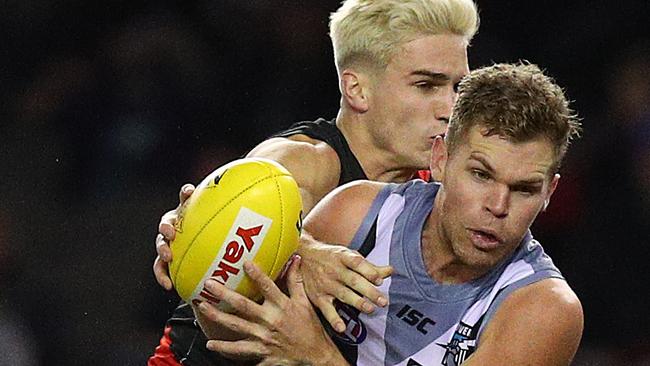 Dan Houston of the Power takes a grab against the Bombers at Marvel Stadium on Saturday. Picture: Graham Denholm/Getty Images