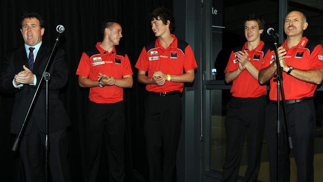 The 2009 draft, where Melbourne snared high picks off the back of their poor season. Chris Connolly with Tom Scully, Jordan Gysberts, Jack Trengove and coach Dean Bailey.
