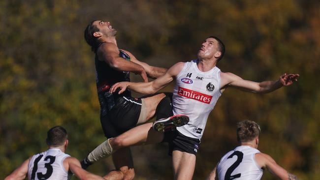 Brodie Grundy, left, goes up against fellow big man Darcy Cameron at Collingwood training. Picture: Michael Dodge/AAP