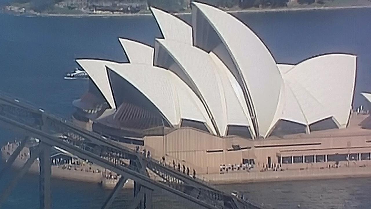 Prince Harry leads a group on the Sydney Harbour Bridge climb. Picture: Seven News