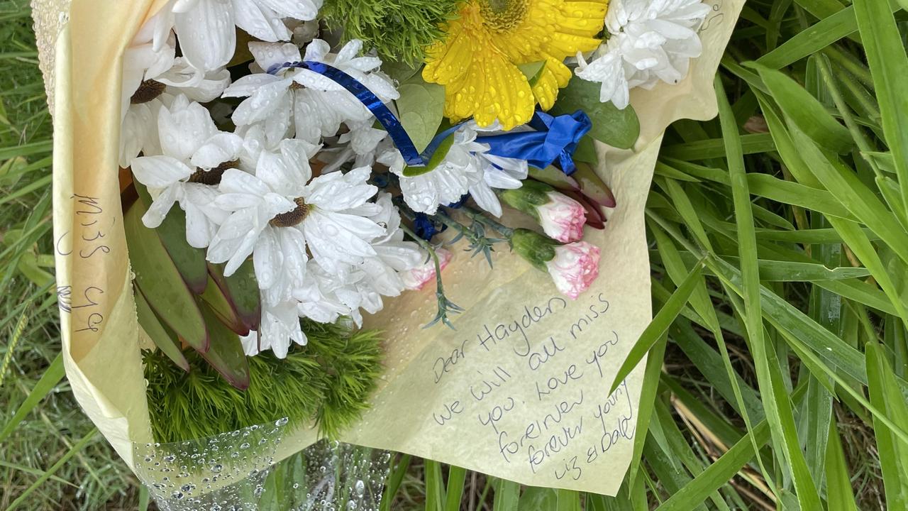 Flowers laid at the intersection where motorcyclist Hayden Webb died.