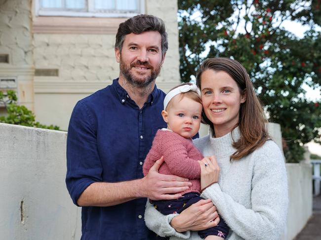 Daniel Mortensen and Julie Davaine with their daughter Margaux Mortensen,1, at their Bondi unit which they are selling mid-lockdown.Picture: Justin Lloyd.