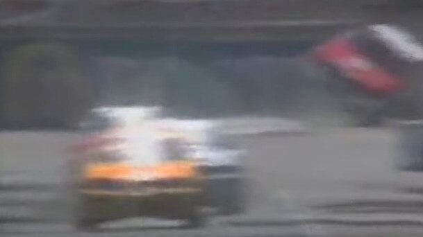 Mark Skaife takes the corner with too much force