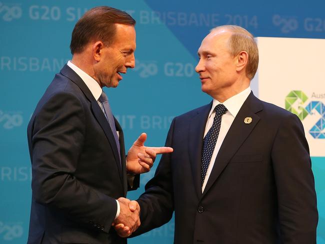 BRISBANE, AUSTRALIA - NOVEMBER 15:  Australian Prime Minister Tony Abbott greets Russia's President Vladimir Putin during the official welcome at the Brisbane Convention and Exhibitions Centre on November 15, 2014 in Brisbane, Australia. World leaders have gathered in Brisbane for the annual G20 Summit and are expected to discuss economic growth, free trade and climate change as well as pressing issues including the situation in Ukraine and the Ebola crisis.  (Photo by Chris Hyde/Getty Images)