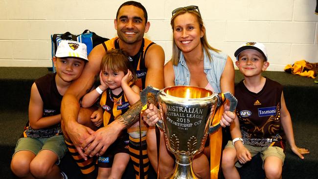 Shaun Burgoyne with his wife Amy and children Ky, Leni and Percy with the 2015 premiership cup.