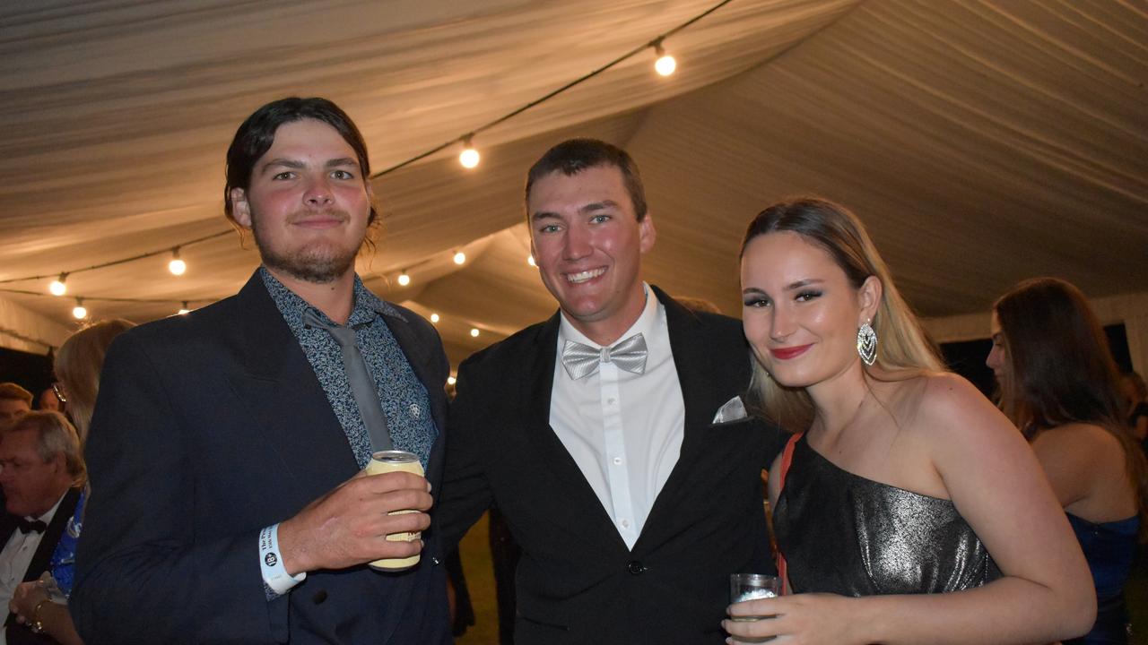 Angus Muller of Proserpine, Miles Dodd of Proserpine, and Sienna Mau of Proserpine at the 2021 Proserpine Show Ball. Picture: Kirra Grimes.