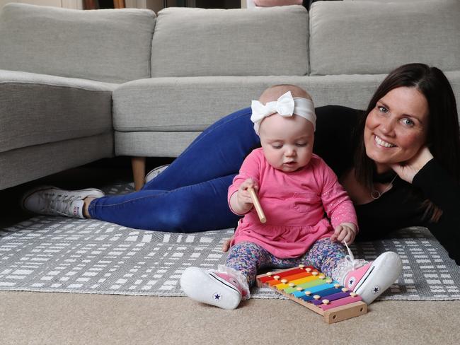 Mairead Mangan with her baby, Darcey O'Donnell, aged 11 months. who was born premature due to screening for cervical cancer. Picture: David Swift