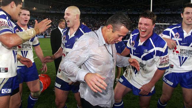 Folkes after leading the Bulldogs to their grand final triumph in 2003. (Chris McGrath/Getty Images)