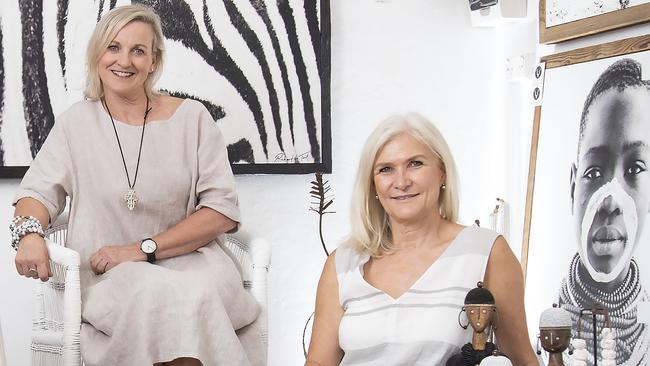 Africanologie owners Jacqui Varasdi, left, and Dael Lane, in their pop-up shop in Lawrence St, Freshwater, where they sell fully imported artwork and homewares from Africa. Picture: Troy Snook