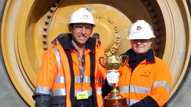 Evolution boss Jake Klein and employee Cassie Schiller with the Melbourne Cup at the Cowal mine, in 2016.