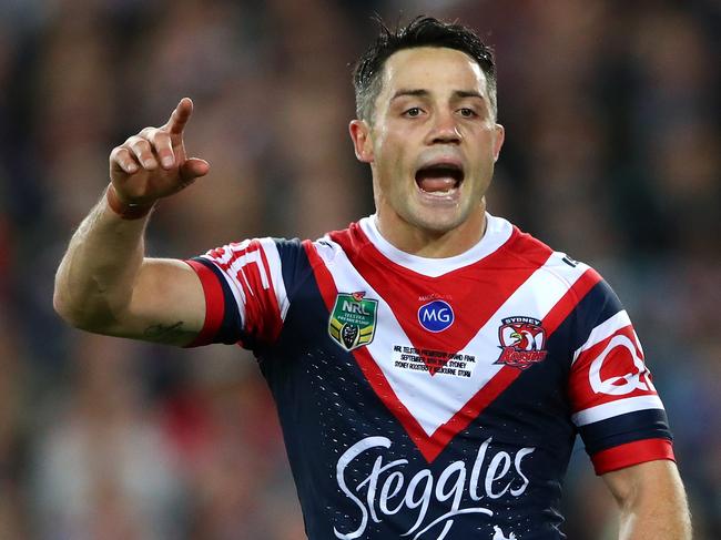 SYDNEY, AUSTRALIA - SEPTEMBER 30: Cooper Cronk of the Roosters signals to team mates during the 2018 NRL Grand Final match between the Melbourne Storm and the Sydney Roosters at ANZ Stadium on September 30, 2018 in Sydney, Australia.  (Photo by Cameron Spencer/Getty Images)