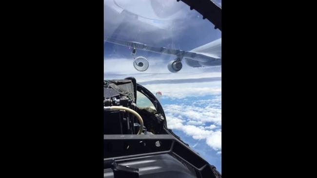 This fighter jet was helped to refuel by this airliner in spectacular scenes posted by the Australian Royal Air Force. Picture: RAAF