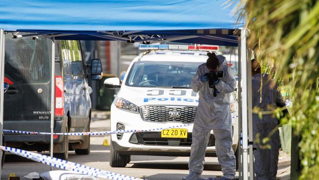 Forensic officers at the scene. Picture: David Swift.