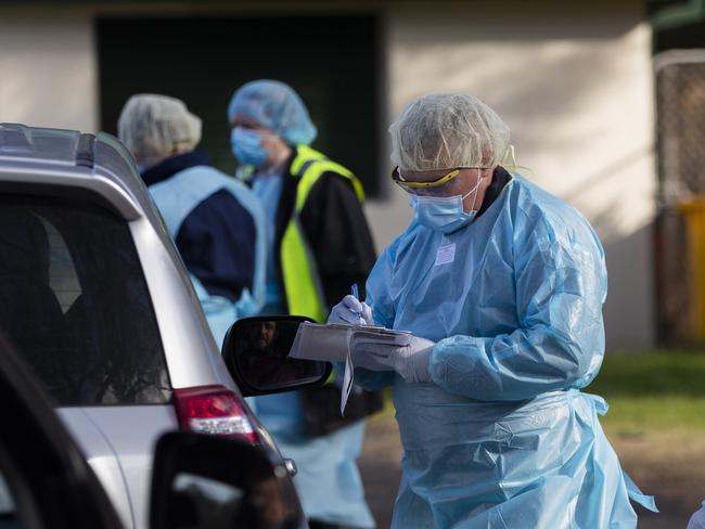 SYDNEY, AUSTRALIA - JULY 14: Tests are carried out at a pop-up COVID-19 testing clinic at Victoria Park in Picton on July 14, 2020 in Sydney, Australia. Twenty-eight confirmed COVID-19 cases have also now been linked to the Crossroads Hotel in the south-west Sydney suburb of Casula. All visitors to the pub from 3-10 July are now being urged by health authorities to self-isolate and get a coronavirus test.  (Photo by Brook Mitchell/Getty Images)