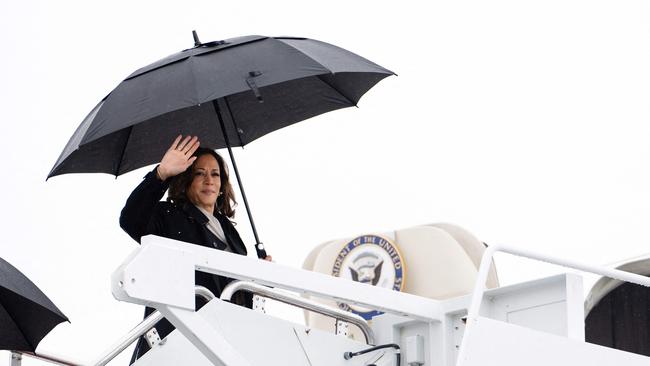 Vice President Kamala Harris waves as she boards Air Force Two at Joint Base Andrews in Maryland.