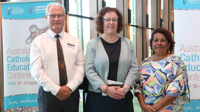 Catholic Education Diocese of Cairns Executive Director Bill Dixon with National Catholic Education Executive Director Jacinta Collins and artist Susan Reys. Picture: Sandhya Ram