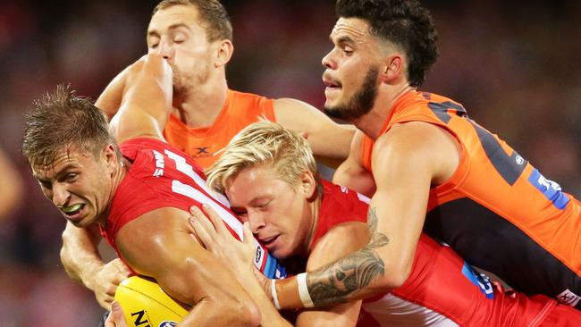 SYDNEY, AUSTRALIA — APRIL 22: Kieren Jack of the Swans is challenged during the round five AFL match between the Sydney Swans and the Greater Western Sydney Giants at Sydney Cricket Ground on April 22, 2017 in Sydney, Australia. (Photo by Matt King/AFL Media/Getty Images)