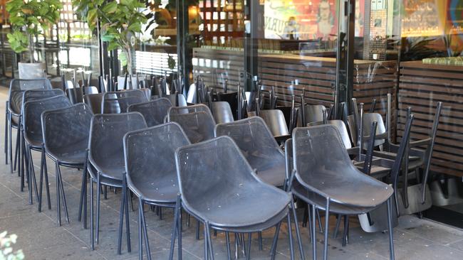 Restaurant seats are stacked up at Southbank during Melbourne’s stage four COVID-19 lockdown. Picture: NCA NewsWire/David Crosling