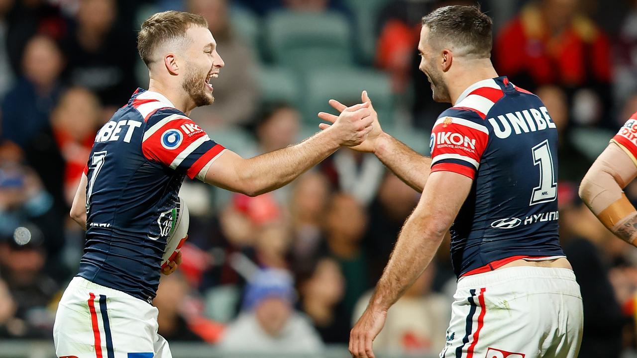 PERTH, AUSTRALIA - AUGUST 02: Sam Walker of the Roosters celebrates his try with his team mates during the round 22 NRL match between Dolphins and Sydney Roosters at HBF Park, on August 02, 2024, in Perth, Australia. (Photo by James Worsfold/Getty Images)