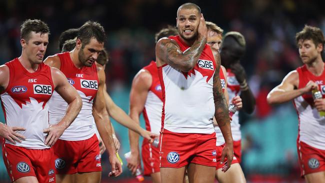 Disappointed Swans players Luke Parker, Josh Kennedy and Lance Franklin after Thursday night’s loss to Melbourne. Picture: Phil Hillyard