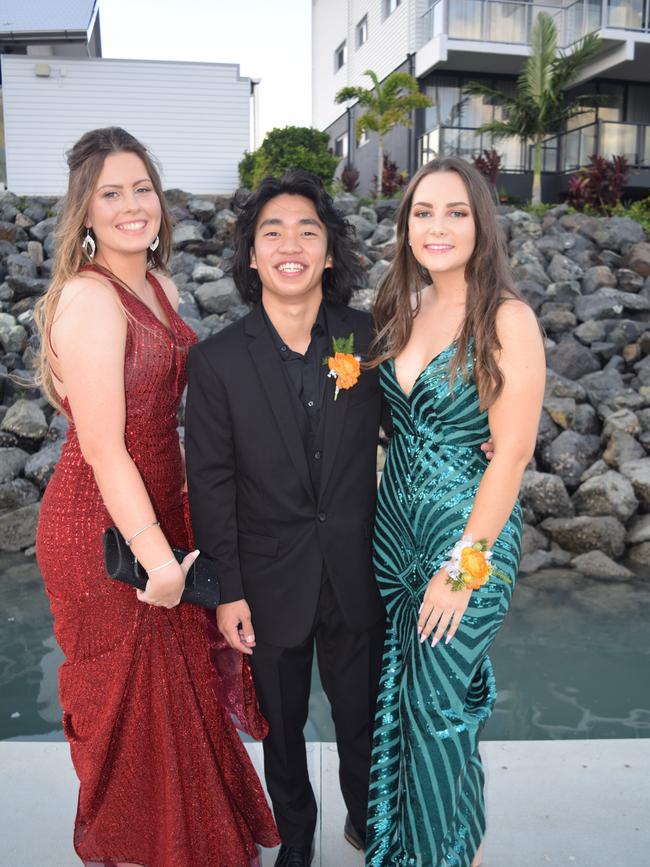 Chantelle Selman, Carlo Urbano and Lucy Head at the Proserpine State High School formal. Picture: Elyse Wurm