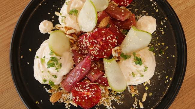 Vanilla bean yoghurt whip with poached rhubarb and pear, toasted seeds, nuts and coconut.