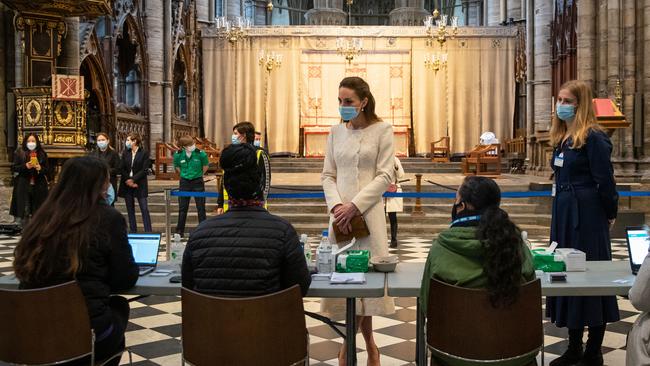 Catherine, Duchess of Cambridge speaks with staff during a visit to the COVID-19 vaccination centre at Westminster Abbey on March 23. Picture: Getty