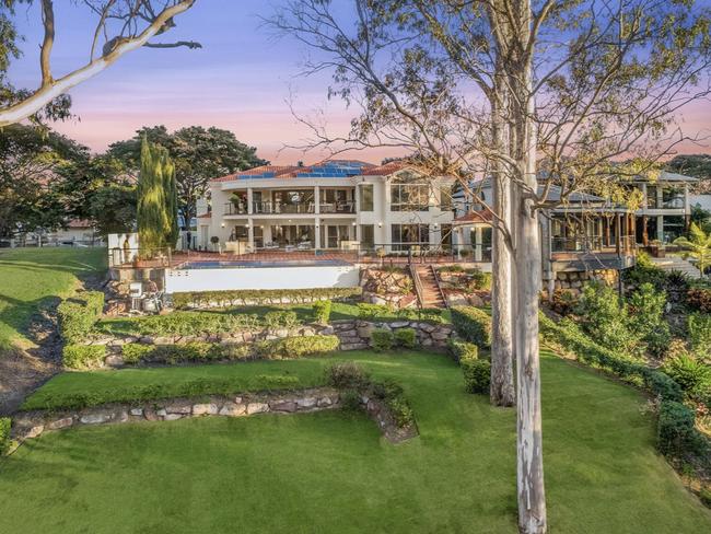 Prestigious riverfront Brisbane home heads to auction this weekend