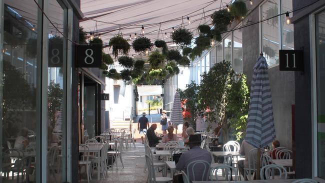 An alleyway which was once dead, now revitalised into a restaurant district. Picture: Tom McGann