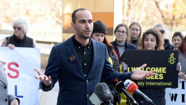 Mr Azimitabar addresses his supporters outside the Federal Court on Thursday. Picture: NCA NewsWire / Andrew Henshaw