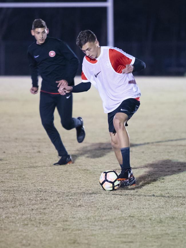Kristian Popovic (white bib) son of Tony Popovic, playing for Western Sydney Wanderers youth team with brother Gabrielle in the background.