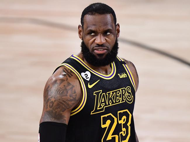 LAKE BUENA VISTA, FLORIDA - OCTOBER 02: LeBron James #23 of the Los Angeles Lakers reacts during the first half against the Miami Heat in Game Two of the 2020 NBA Finals at AdventHealth Arena at ESPN Wide World Of Sports Complex on October 02, 2020 in Lake Buena Vista, Florida. NOTE TO USER: User expressly acknowledges and agrees that, by downloading and or using this photograph, User is consenting to the terms and conditions of the Getty Images License Agreement.   Douglas P. DeFelice/Getty Images/AFP == FOR NEWSPAPERS, INTERNET, TELCOS & TELEVISION USE ONLY ==