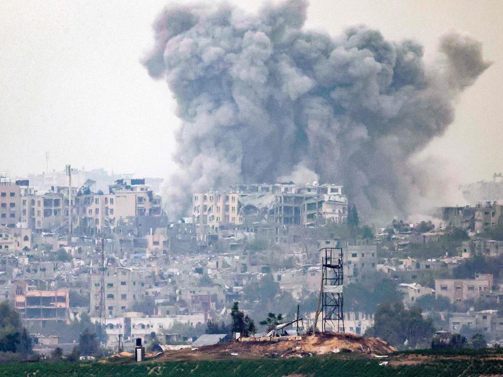 The Gaza Strip near Israel's southern city of Sderot on Thursday shows a smoke plume ascending following Israeli bombardment over the northern Gaza Strip amid the ongoing battles between Israel and the Palestinian group Hamas. Picture: AFP