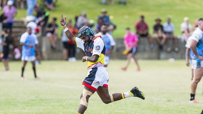 Matthew Gibuma celebrates his try for SEQ Magic against Coastal Blacks in the Warriors Reconciliation Knockout Carnival at Jack Martin Centre, Saturday, January 28, 2023. Picture: Kevin Farmer