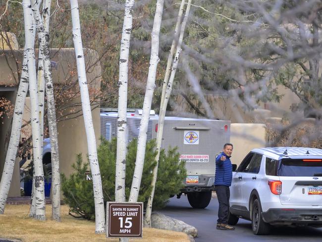 Santa Fe County Sheriff deputies arrive at the gated community where actor Gene Hackman and his wife Betsy Arakawa passed away. Picture: AP