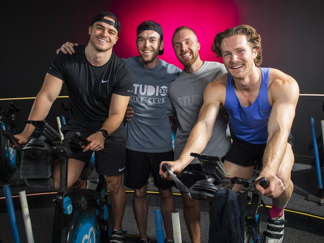Sam Young, Sam Patterson ,Alex Triplow,and Aussie Edwards take part in  a spin class at  Studio 360 Bike Club on Unley road they have a Tik Tok platform they film and join womens classes which is going viral .Thursday,May,1,2025.Picture Mark Brake
