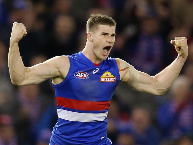 AFL Round 15. 29/06/2018. Western Bulldogs v Geelong at Etihad Stadium.   Western Bulldogs Billy Gowers celebrates his goal in the third quarter  . Pic: Michael Klein