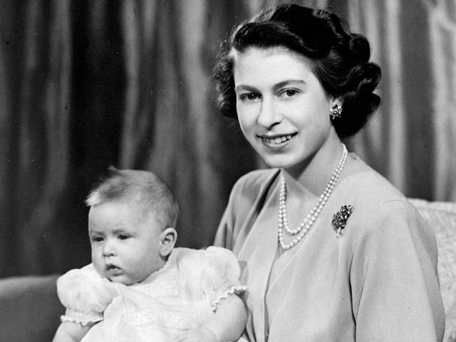 The Queen with her infant son, Prince Charles in a private room at Buckingham Palace. Picture: Getty