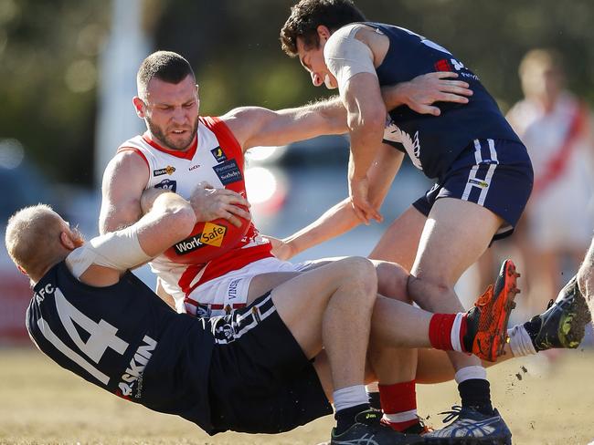 Sorrento star Mitch Hallahan battles with Edi-Asp champ Tim Mannix (No. 14). Picture: Valeriu Campan