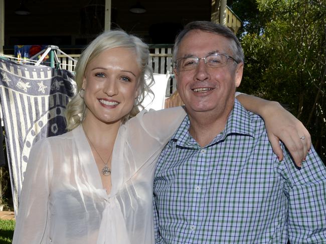 Federal Treasurer Wayne Swan and his eldest daughter Erinn, 28, are pictured at their family home in Brisbane, Thursday, March 28, 2013. Erinn has joined the fight for Labor's re-election in a behind-the-scenes role with the party's federal headquarters. (AAP Image/Dan Peled) NO ARCHIVING