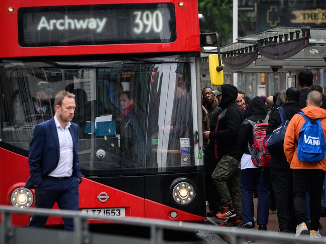 LONDON, ENGLAND - JUNE 06: Commuters queue to board packed buses at Victoria Station as a tube strike impacts the Monday morning rush hour on June 06, 2022 in London, England. Transport for London (TfL) warned of widespread disruption to Underground service today as about 4,000 station staff represented by the RMT union have gone on strike in a dispute over job cuts and pensions. (Photo by Leon Neal/Getty Images)