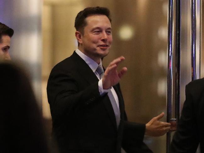 (FILES) This file photo taken on February 13, 2017 shows Elon Musk, the co-founder and chief executive of Electric carmaker Tesla, during a ceremony in Dubai. Tesla founder and technology luminary Elon Musk said May 31, 2017 he would quit President Donald Trump's business advisory councils if Washington pulls out of the Paris climate accord. Musk's move, announced on Twitter, could deepen the rift between the tech world and the Trump administration, which have been at odds over immigration and other issues.  / AFP PHOTO / KARIM SAHIB